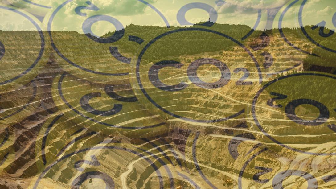 Carbon credits overlaid on an open-cut coal mine