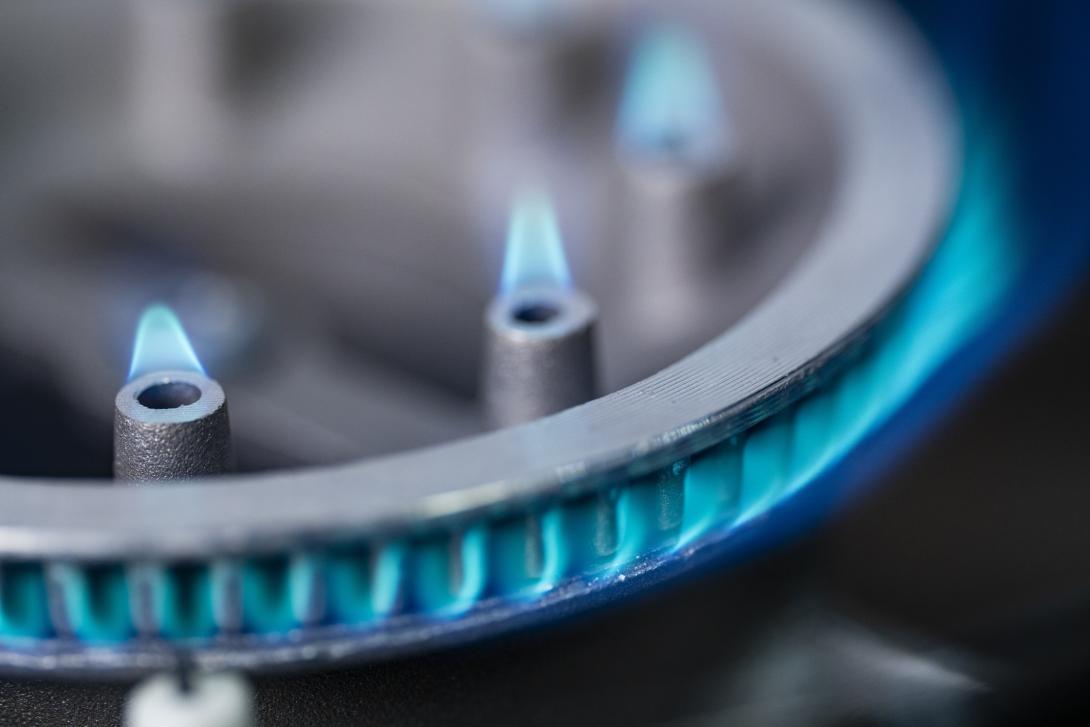 Blue Gas Flame Burning on Modern Kitchen Stove