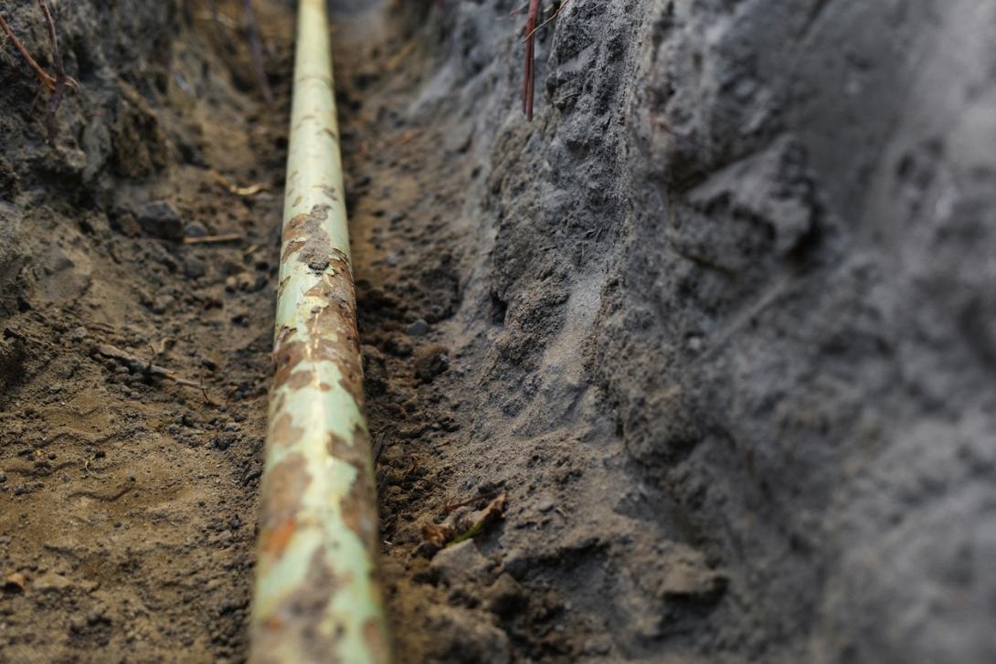 residential gas pipe in a trench.