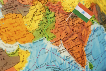 map with miniature flag of India